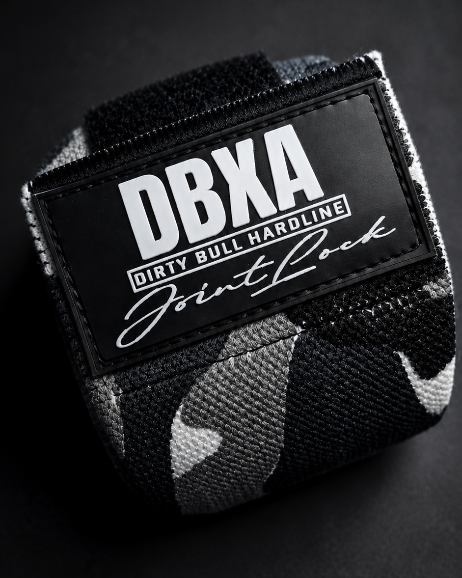 Black and white camouflage wrist wrap with DBXA branding on a black background