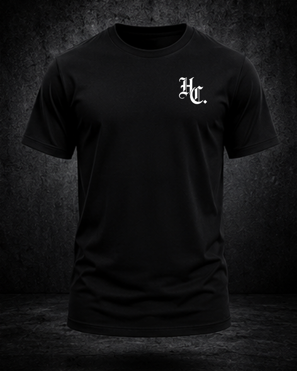 Black Hardline Co. Tee front view — HC chest monogram