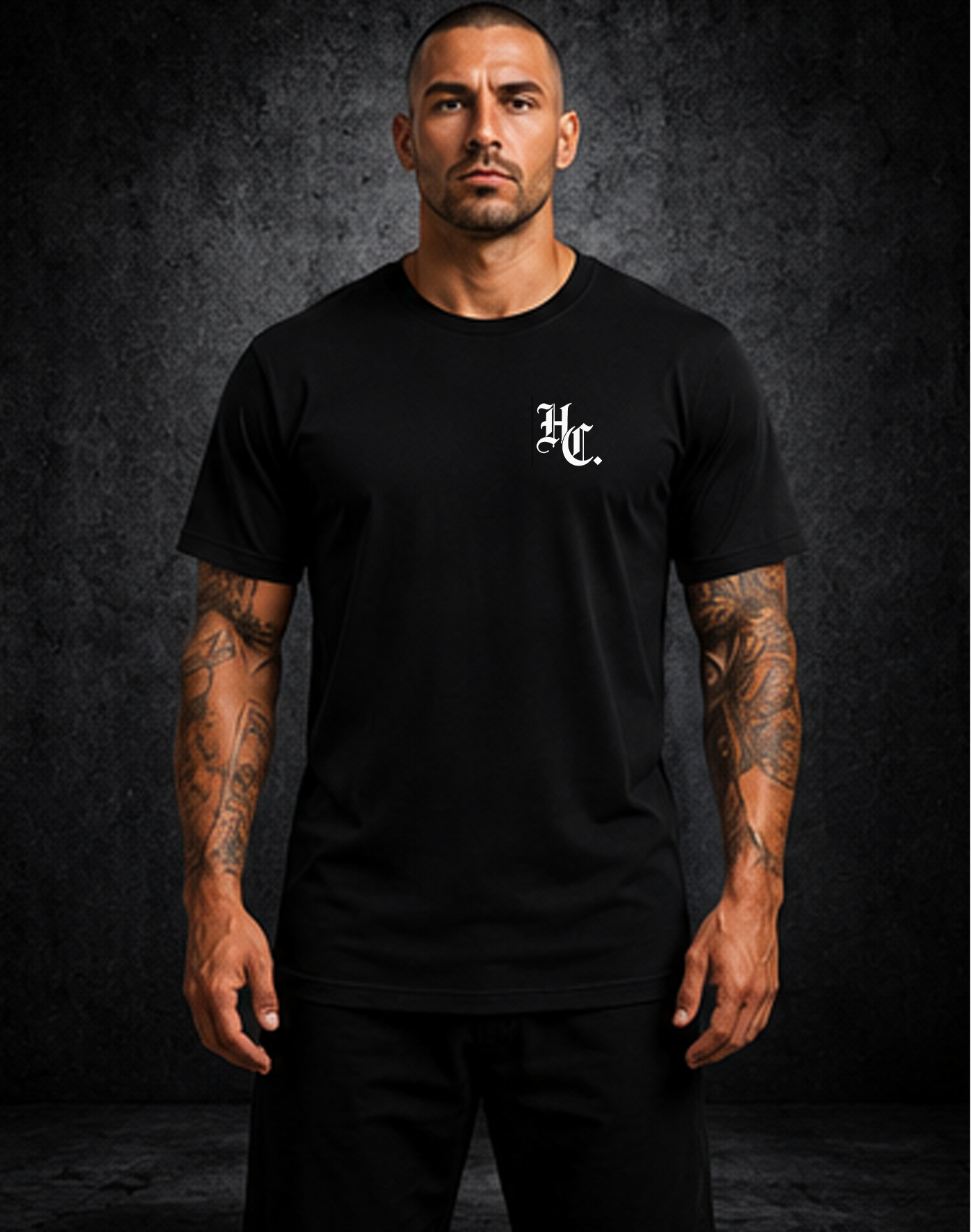Person wearing a white t-shirt with 'Hardline Co.' branding on the back against a dark background