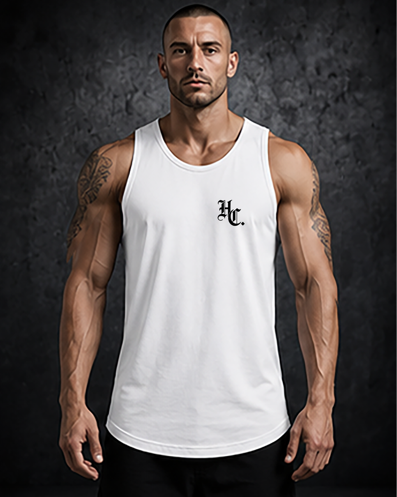 Man wearing a white tank top with a logo on a dark background