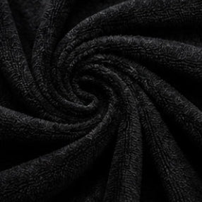 Close-up of black fabric with a textured pattern