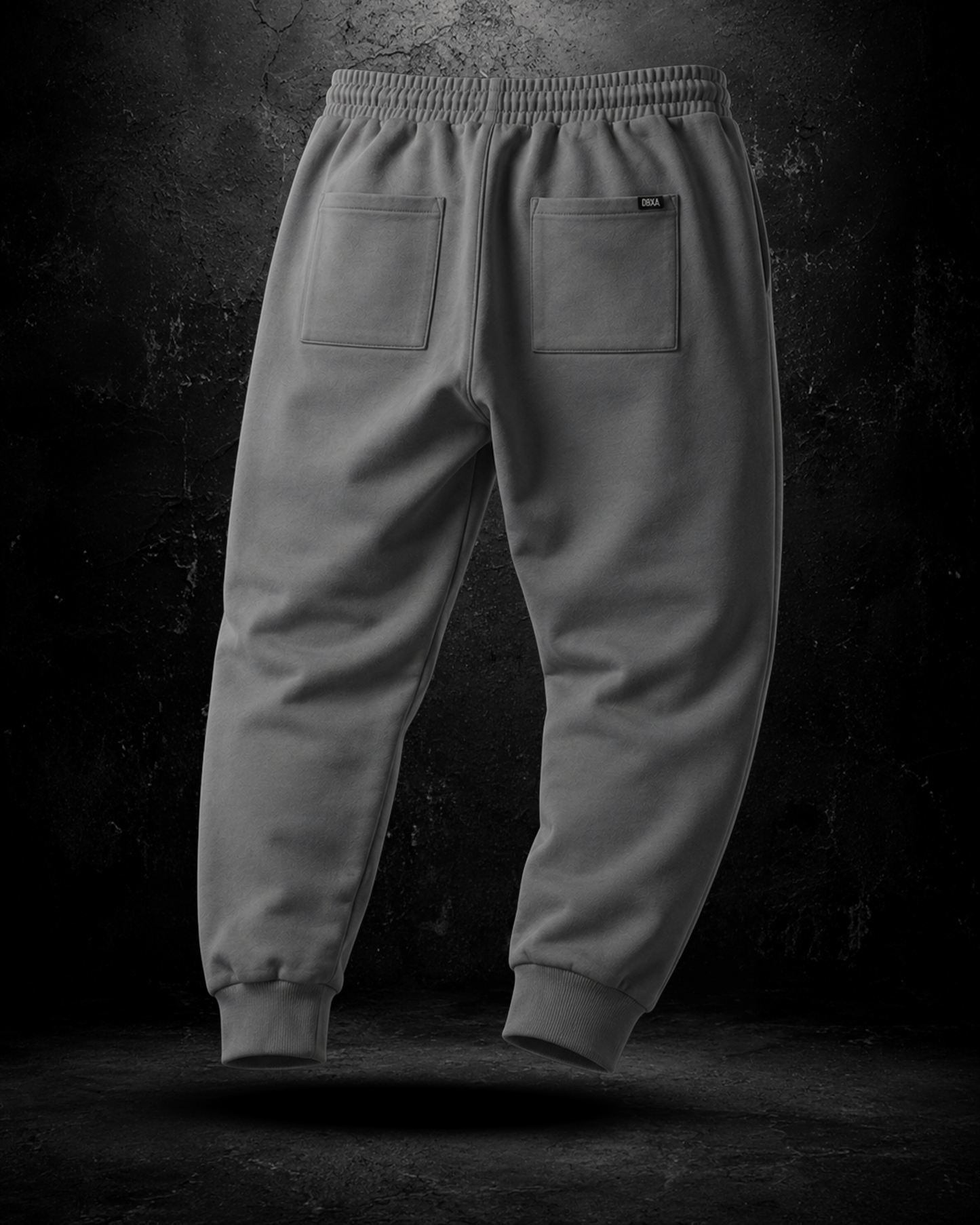 Gray sweatpants on a dark background
