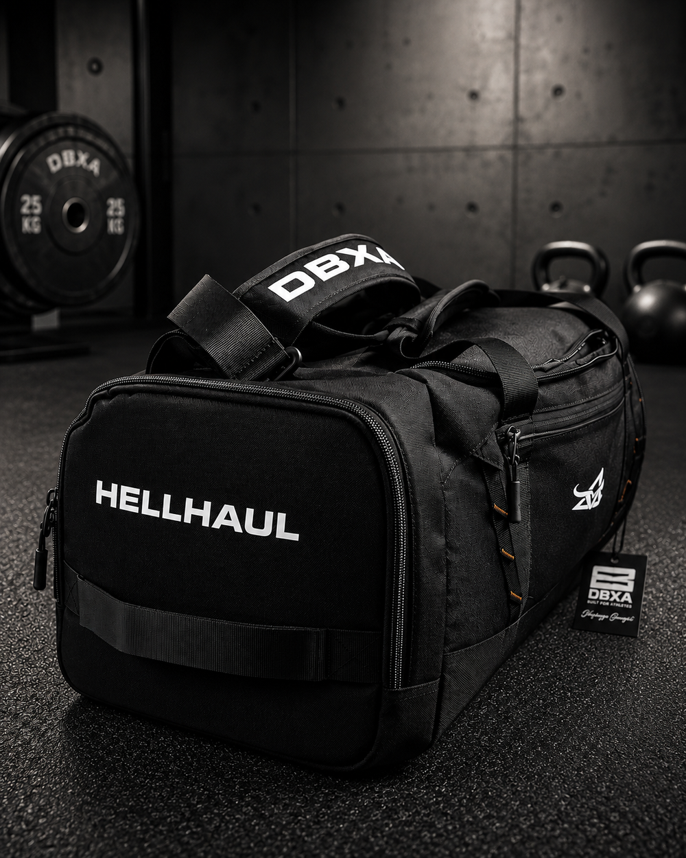 DBXA HellHaul 40L duffel bag shown from the front and side in a gym setting