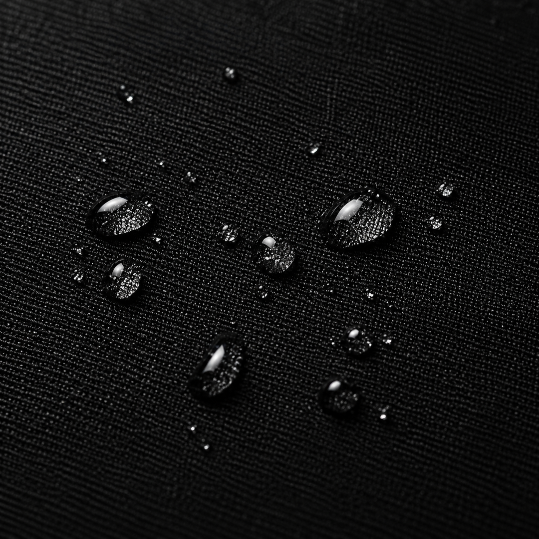 Close-up of water beading on the DBXA HellHaul bag exterior fabric