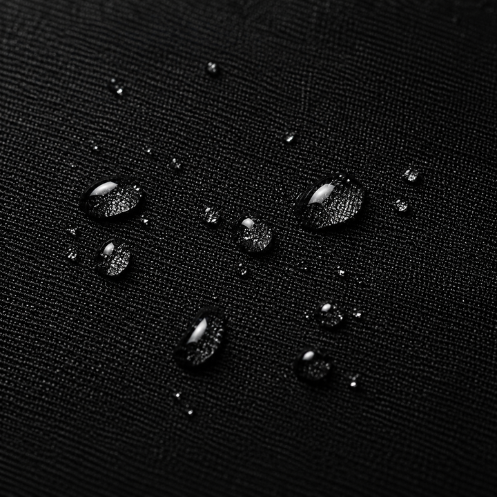 Close-up of water beading on the DBXA HellHaul bag exterior fabric