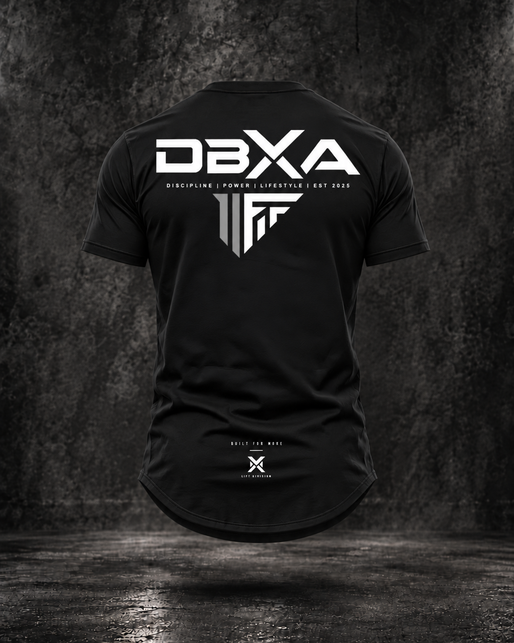 Black DBXA Lift Division tapered longline curved-hem tee rear-view mockup, with white DBXA wordmark, grey and white Lift emblem and Built for More detail.