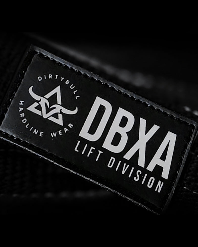 Black patch with 'DBXA Lift Division' text and logo on a dark background