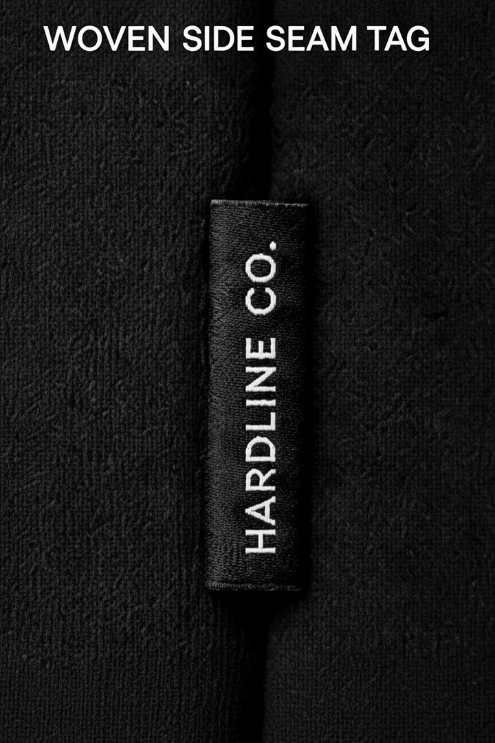 Close-up of the woven Hardline Co. side-seam label