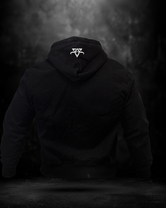 Black hoodie with a logo on the back against a dark background