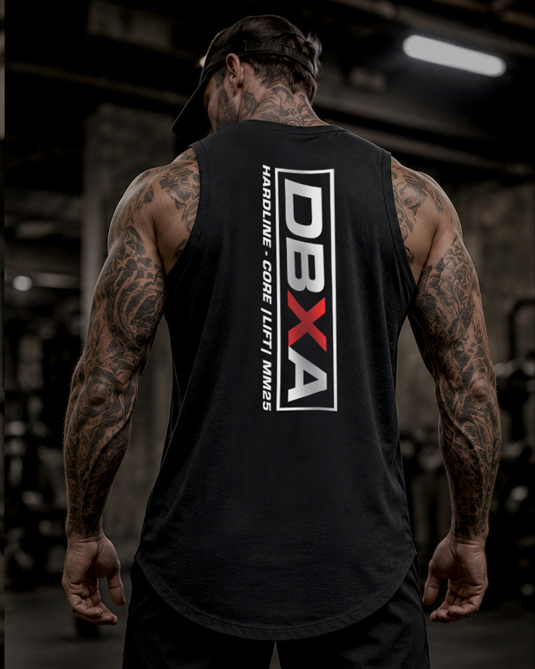 Muscular man wearing a black DBXA Hardline Tank showing the vertical rear logo