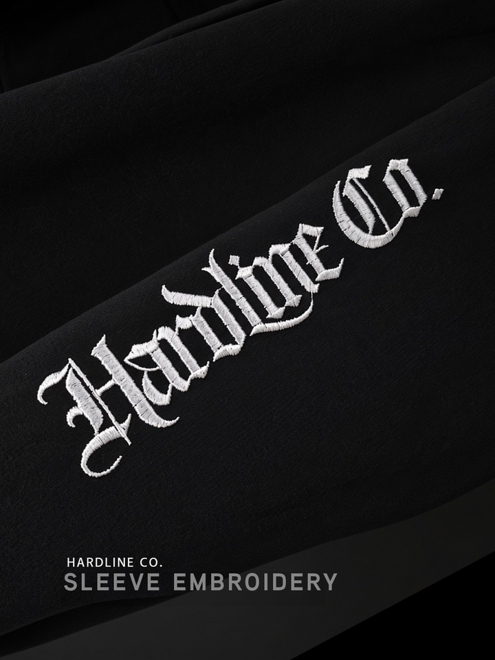 Close-up of Hardline Co. embroidery on the hoodie sleeve